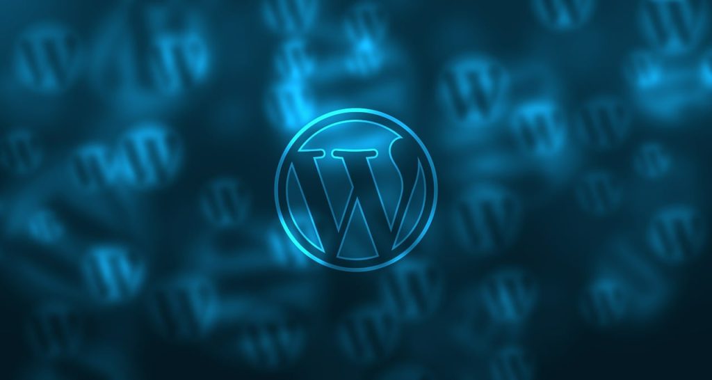 Glowing blue WordPress logo on a dark background with blurred duplicate logos